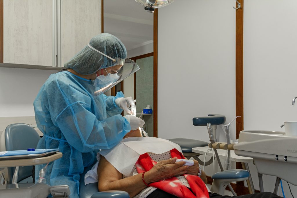 Dentist working in San Pedro clinic
